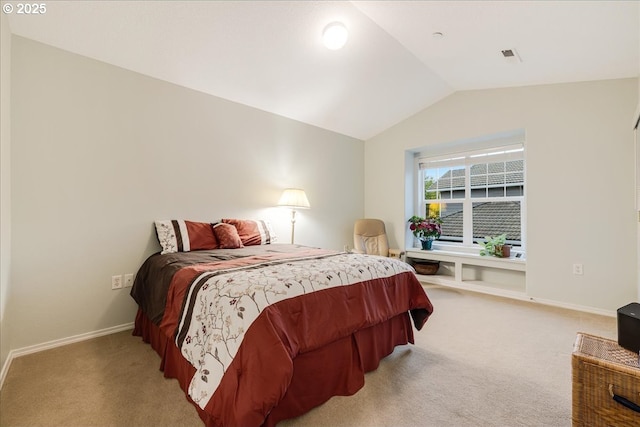 bedroom with visible vents, light colored carpet, baseboards, and lofted ceiling