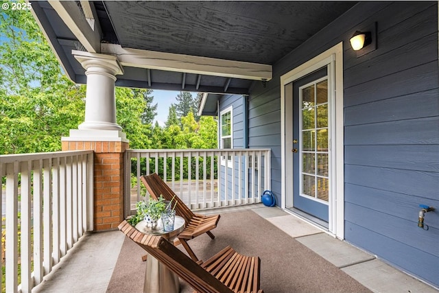 balcony featuring covered porch