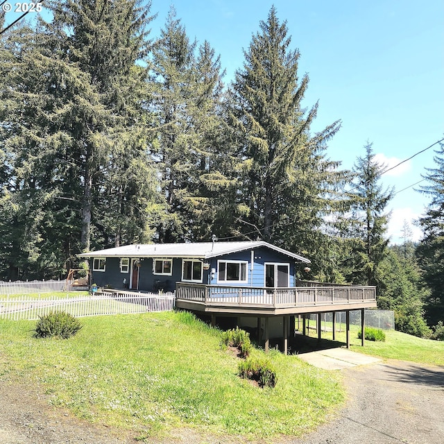 97640 Kadora Ln, North Bend, OR 97459 - view of front of property with a deck and concrete driveway