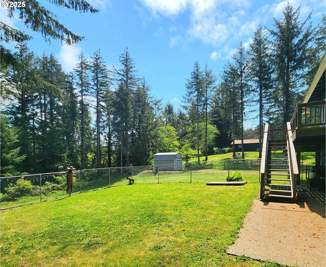 97640 Kadora Ln, North Bend, OR 97459 - view of yard featuring stairs and a deck