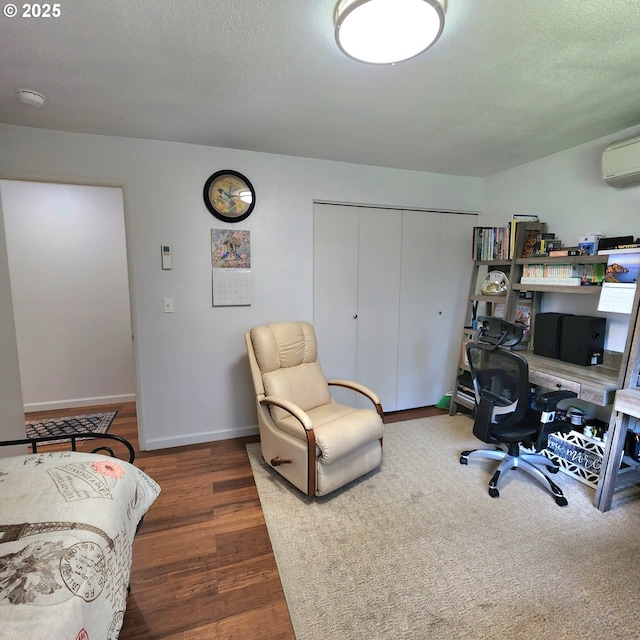 97640 Kadora Ln, North Bend, OR 97459 - office space with wood finished floors, baseboards, and a wall unit AC