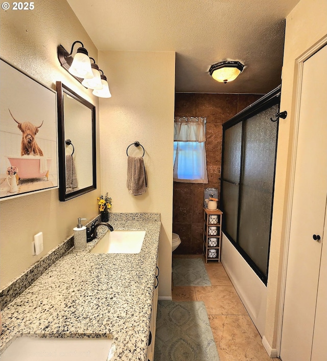 97640 Kadora Ln, North Bend, OR 97459 - full bathroom with toilet, enclosed tub / shower combo, vanity, and a textured ceiling