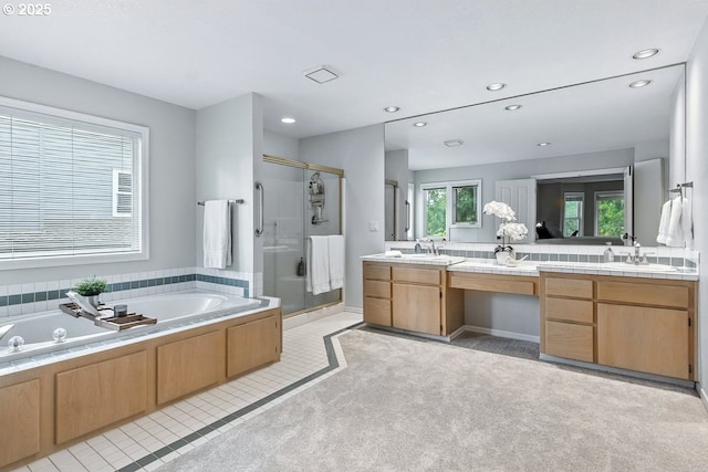 10585 SW 161st Ct, Beaverton, OR 97007 - full bathroom with a shower stall, vanity, a bath, and recessed lighting