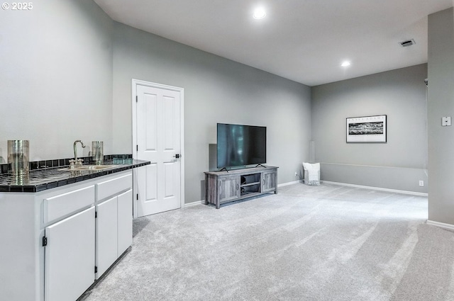 10585 SW 161st Ct, Beaverton, OR 97007 - unfurnished living room featuring light colored carpet and recessed lighting
