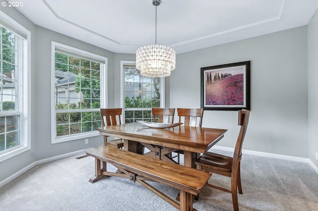 10585 SW 161st Ct, Beaverton, OR 97007 - dining area featuring carpet floors and a chandelier