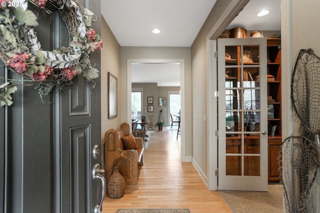 entrance foyer featuring light hardwood / wood-style floors