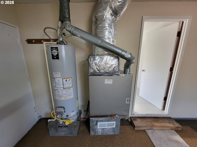 utility room with gas water heater