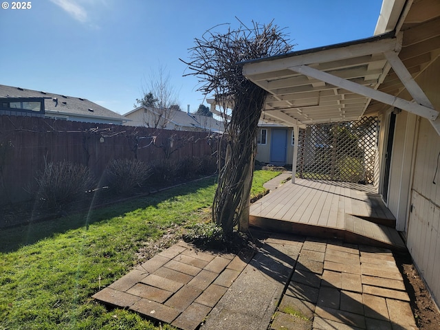 view of yard with a patio and fence