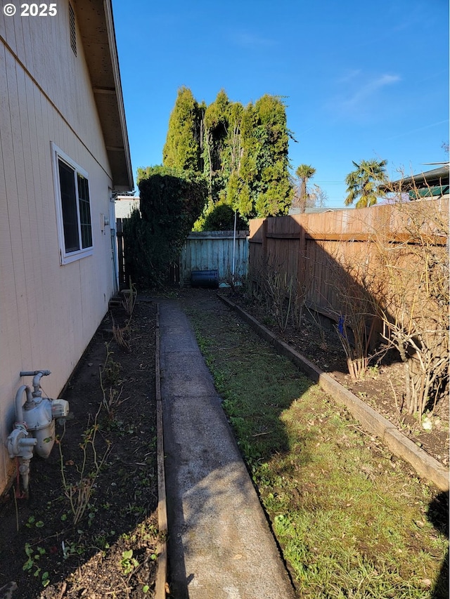 view of yard featuring a fenced backyard