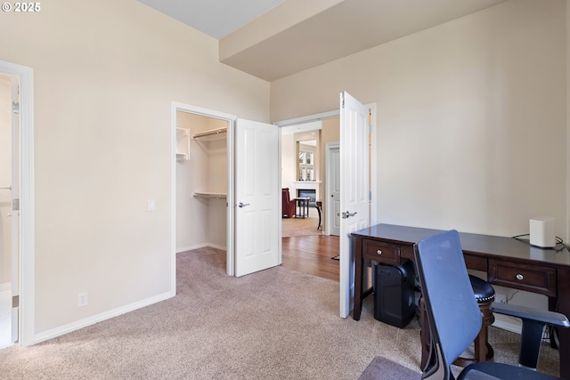 office area with baseboards and carpet