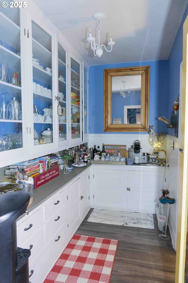 648 W Main St, Carlton, OR 97111 - kitchen with a chandelier, white cabinets, and glass insert cabinets