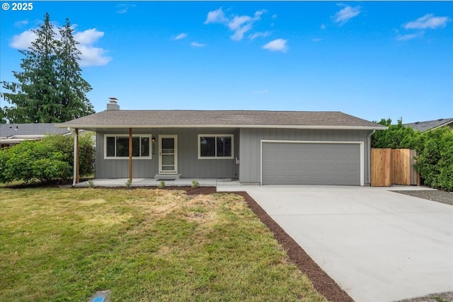 3434 Memorial Park Dr, Longview, WA 98632 - ranch-style home featuring a porch, an attached garage, a chimney, and concrete driveway