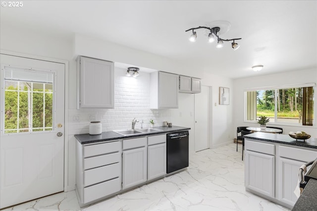 3434 Memorial Park Dr, Longview, WA 98632 - kitchen with dishwasher, dark countertops, light marble finish flooring, and backsplash