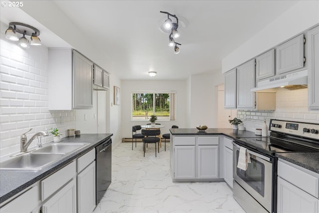 3434 Memorial Park Dr, Longview, WA 98632 - kitchen with stainless steel range with electric cooktop, under cabinet range hood, black dishwasher, dark countertops, and a peninsula
