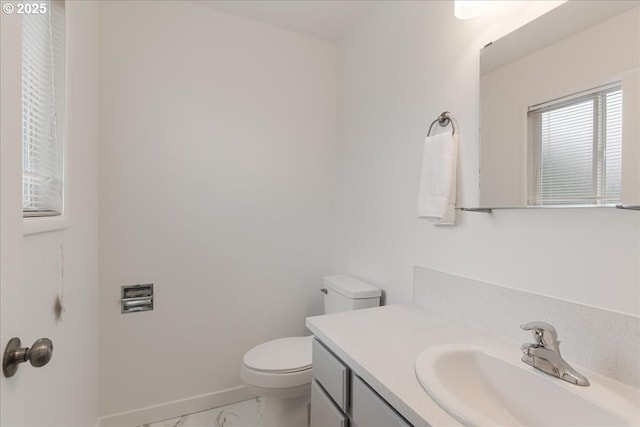 3434 Memorial Park Dr, Longview, WA 98632 - half bathroom with marble look tile flooring and vanity