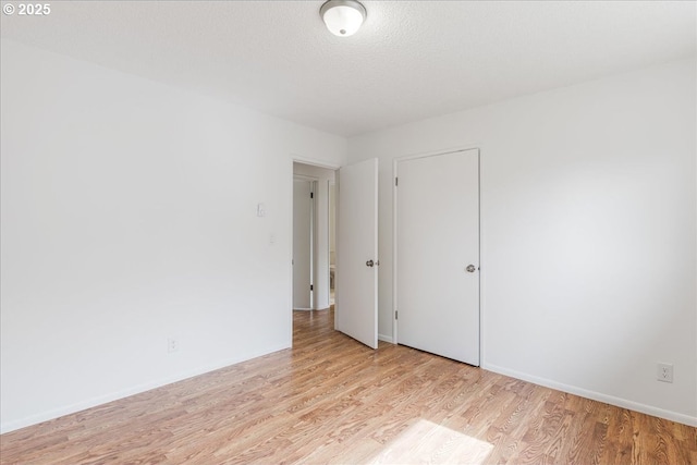 3434 Memorial Park Dr, Longview, WA 98632 - spare room with light wood-style floors and baseboards
