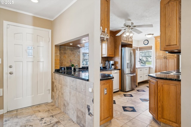 kitchen with decorative backsplash, ornamental molding, ceiling fan, dishwasher, and stainless steel fridge with ice dispenser