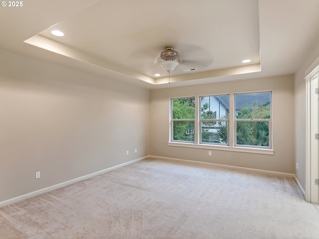 18840 SW Westland Ln, Beaverton, OR 97003 - carpeted spare room featuring a raised ceiling, recessed lighting, and ceiling fan