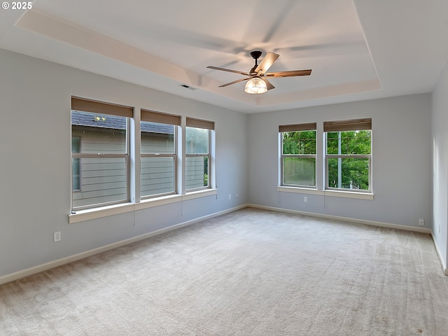 18840 SW Westland Ln, Beaverton, OR 97003 - unfurnished room featuring a raised ceiling, carpet flooring, and ceiling fan