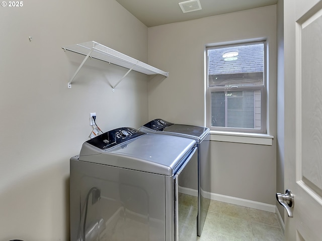 18840 SW Westland Ln, Beaverton, OR 97003 - laundry room featuring independent washer and dryer and baseboards