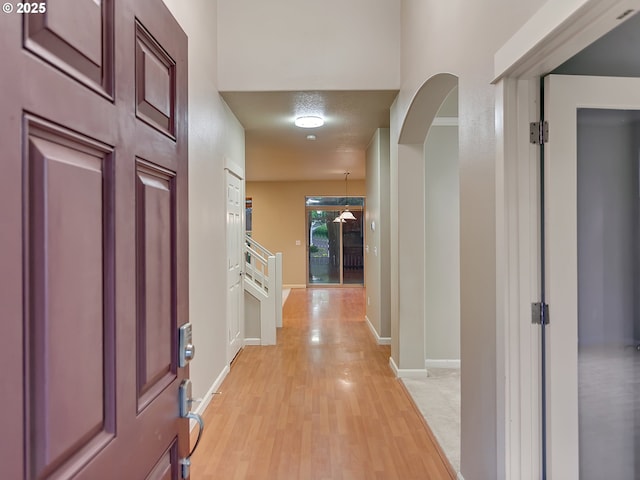 18840 SW Westland Ln, Beaverton, OR 97003 - entryway featuring arched walkways and light wood-style flooring