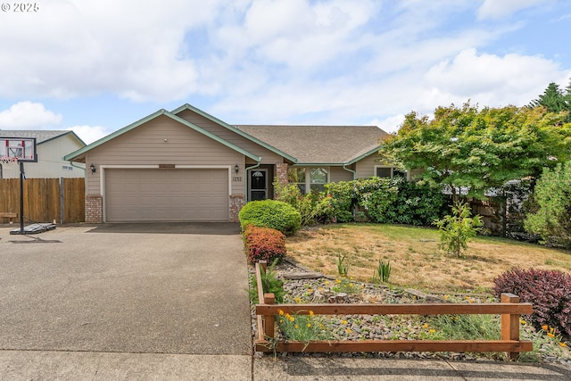 1232 E Fourth Ave, Sutherlin, OR 97479 - ranch-style home with brick siding, driveway, and a garage