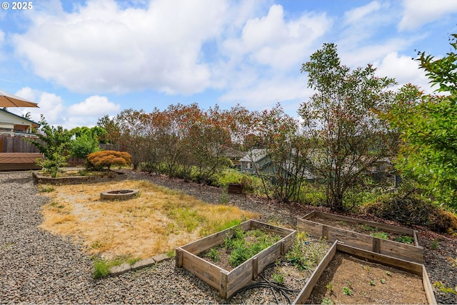 1232 E Fourth Ave, Sutherlin, OR 97479 - view of yard with a fire pit and a vegetable garden