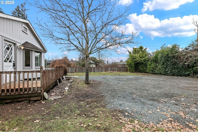 view of yard featuring a wooden deck