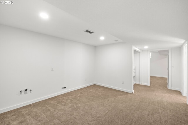 finished below grade area featuring recessed lighting, carpet, and baseboards