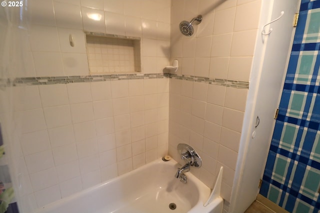 bathroom featuring shower / bath combo with shower curtain