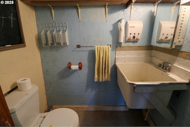 bathroom featuring toilet