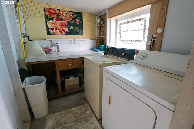 washroom featuring washer and clothes dryer