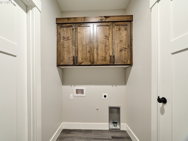 laundry area featuring washer hookup, electric dryer hookup, cabinets, and gas dryer hookup