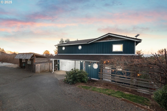 view of property with a storage unit