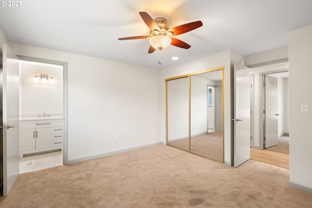 15080 SW 88th Ave, Portland, OR 97224 - unfurnished bedroom featuring light carpet, a closet, ensuite bathroom, and ceiling fan