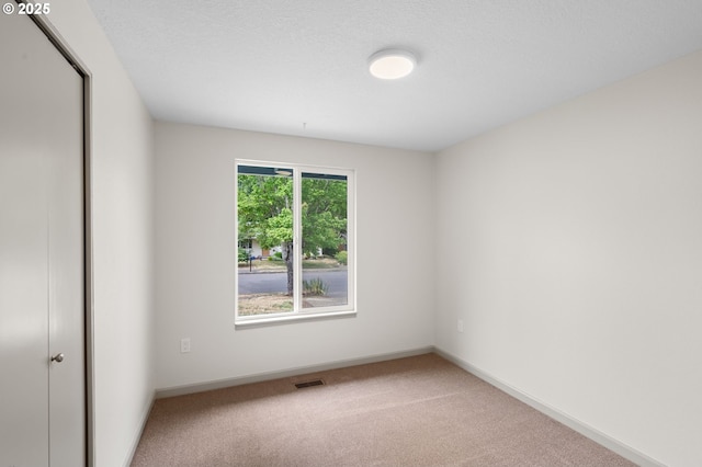 15080 SW 88th Ave, Portland, OR 97224 - carpeted spare room featuring baseboards