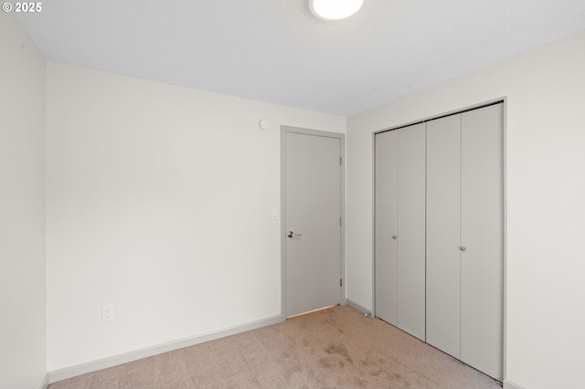 15080 SW 88th Ave, Portland, OR 97224 - unfurnished bedroom with light carpet and a closet