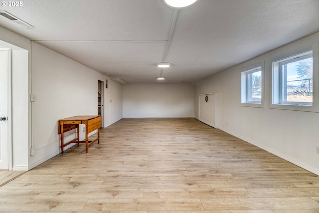 unfurnished room featuring light wood-type flooring