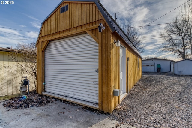 view of outbuilding with a garage