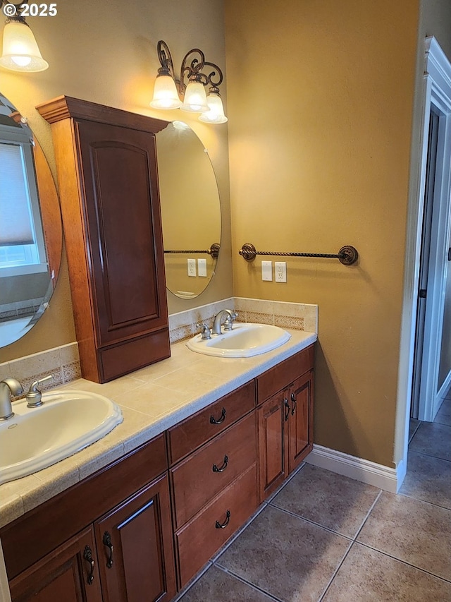 102 Sarah Bear Ln, Winston, OR 97496 - full bathroom featuring baseboards, tile patterned floors, a sink, and double vanity