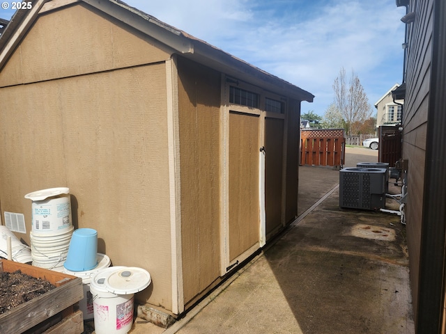 102 Sarah Bear Ln, Winston, OR 97496 - view of outdoor structure with central AC unit, fence, and an outdoor structure