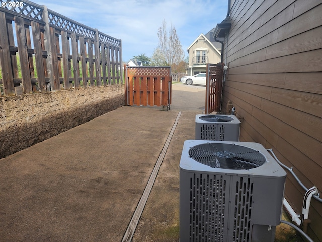 102 Sarah Bear Ln, Winston, OR 97496 - exterior space with central AC and fence