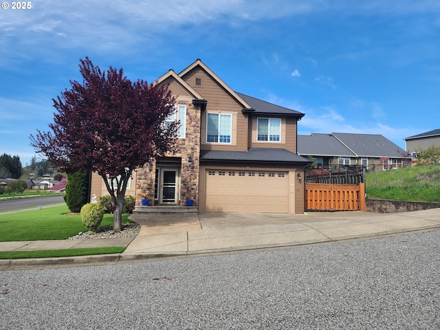 102 Sarah Bear Ln, Winston, OR 97496 - traditional-style home with fence, stone siding, driveway, and a garage