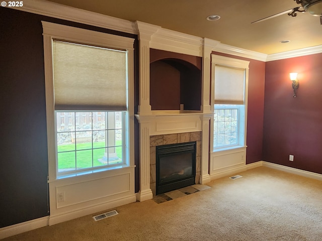 102 Sarah Bear Ln, Winston, OR 97496 - unfurnished living room featuring plenty of natural light, visible vents, carpet floors, and crown molding