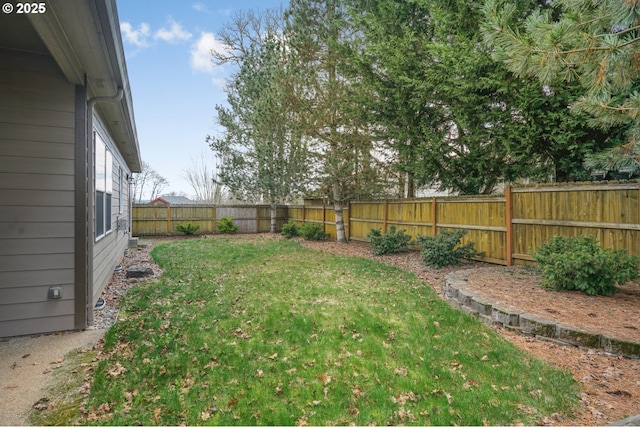 view of yard featuring a fenced backyard