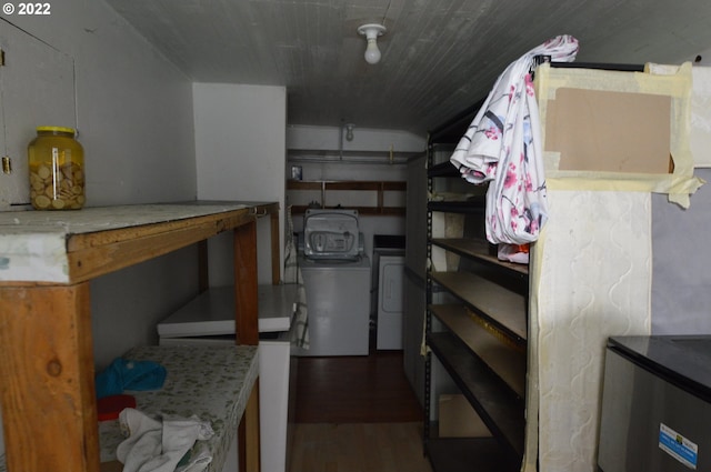 storage with a garage and washing machine and clothes dryer