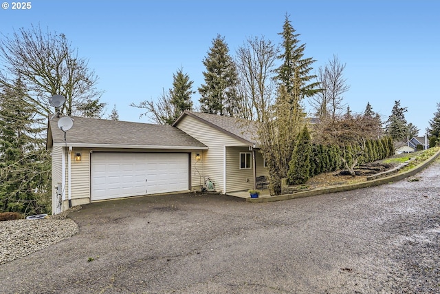 view of property exterior with a garage