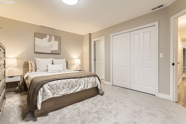 carpeted bedroom featuring a closet