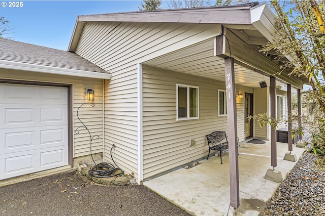 view of property exterior featuring a garage