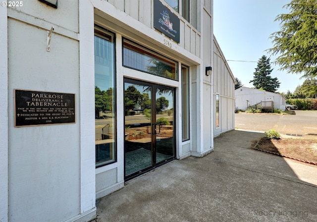 5740 NE Lombard St, Portland, OR 97218 - property entrance with board and batten siding